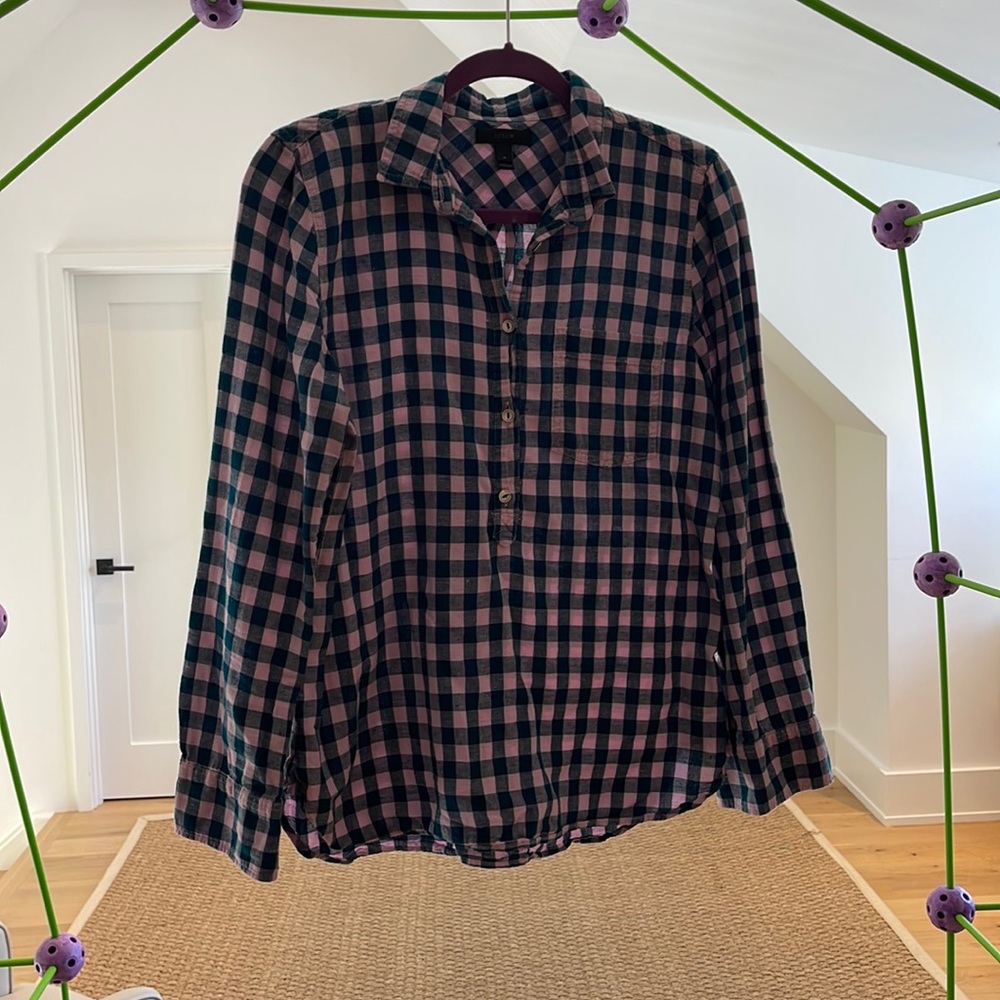 Jcrew 100% cotton linen shirt. Buttons go down about 3/4 of the way.